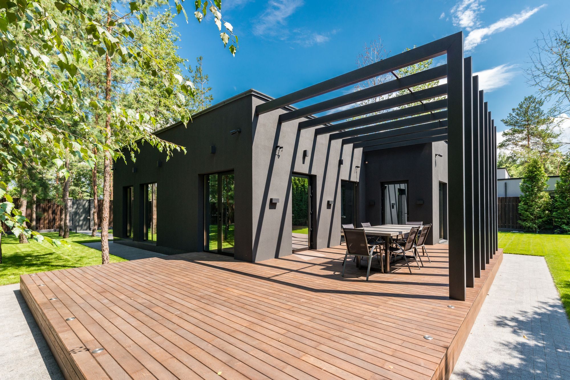 Backyard deck with an outdoor dining set