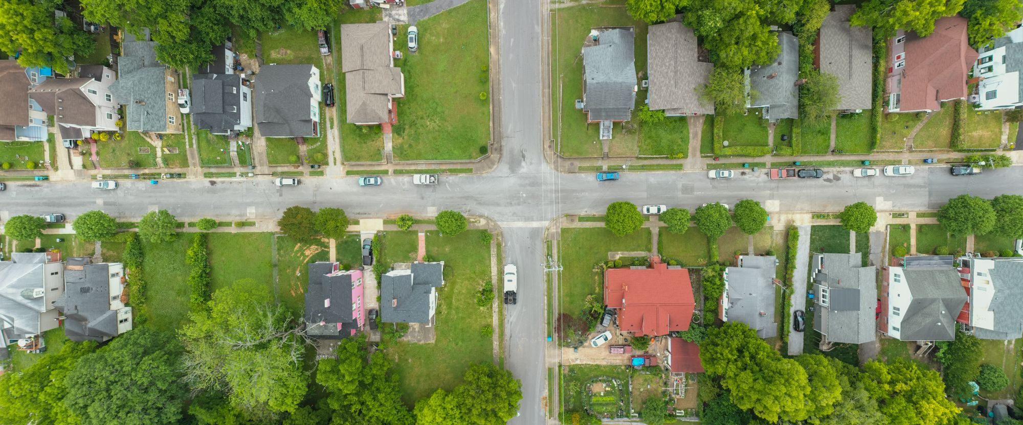 Aerial view of a suburban neighborhood intersection