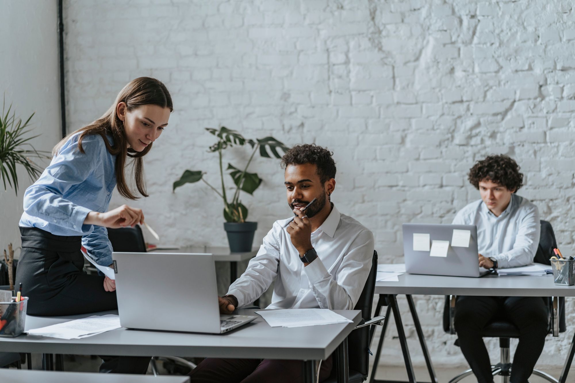 Team working together in an open office