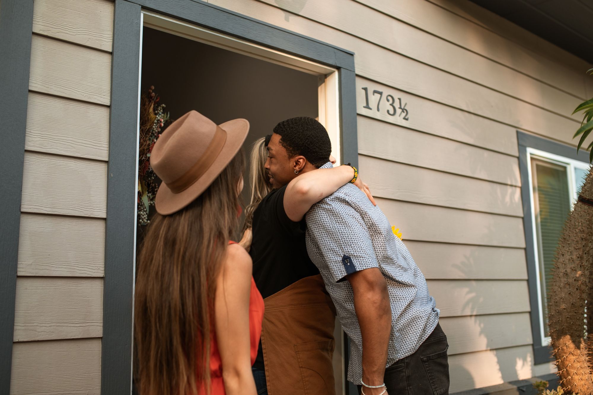 Couple at the front door of their new home